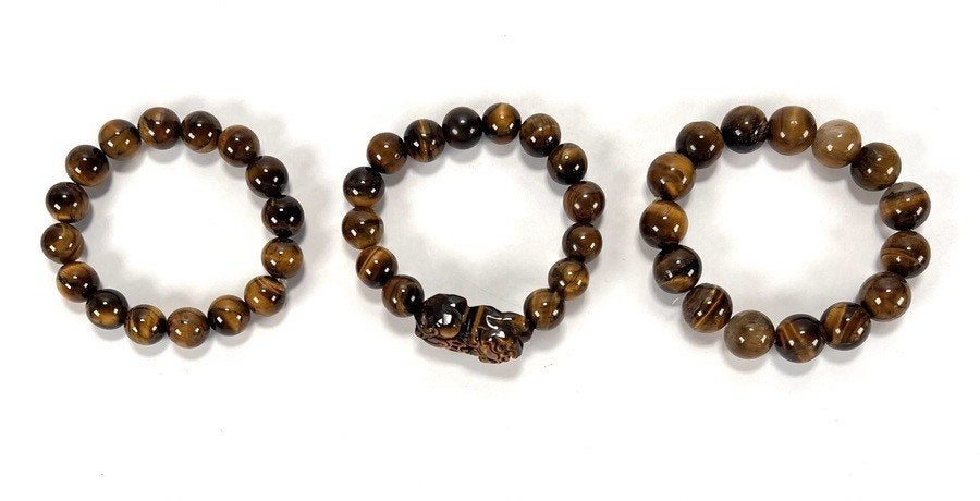 1054. Tijgeroog armbanden, 20e eeuw, Antiek en Kunst, Ophalen of Verzenden