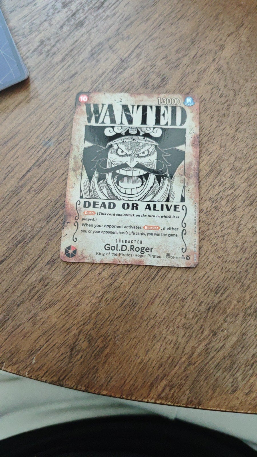 One Piece Kaart Gol D. Roger OP09-118 (Wanted), Ophalen of Verzenden, Zo goed als nieuw, Losse kaart