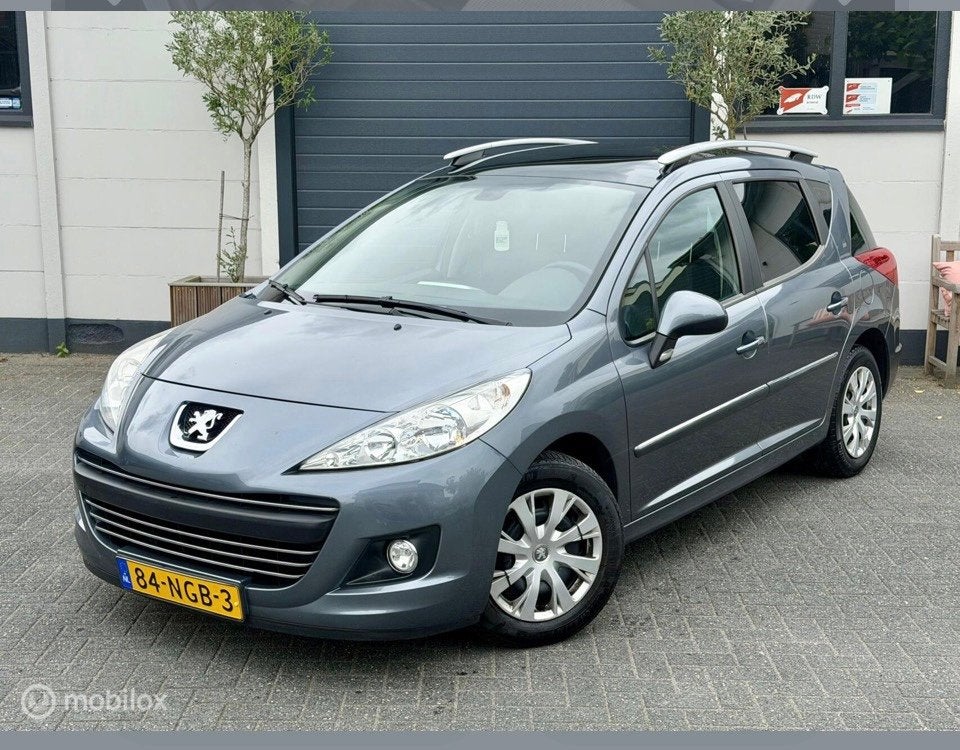 Peugeot 207 SW RIJKAAR/APK/HISTORY/PANORAMADAK/TREKHAAK/NAP/, Auto's, Voorwielaandrijving, Euro 5, Stof, Gebruikt