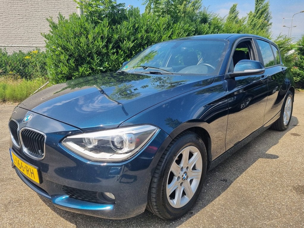 BMW 1-serie 116i Business Line 5 Deurs Clima Xenon, Auto's, 1-Serie, Euro 5, Gebruikt, Zwart