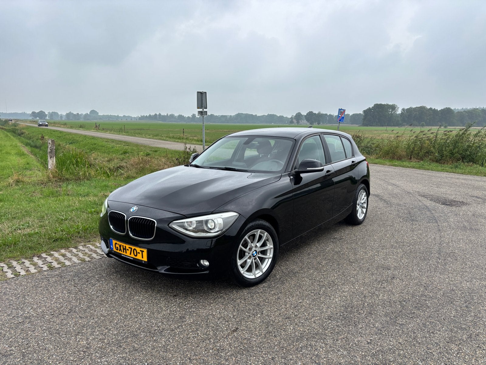 BMW 1-Serie 116I 100KW 5DR 2012 Zwart, Auto's, 1-Serie, Zwart, 4 cilinders, Zwart