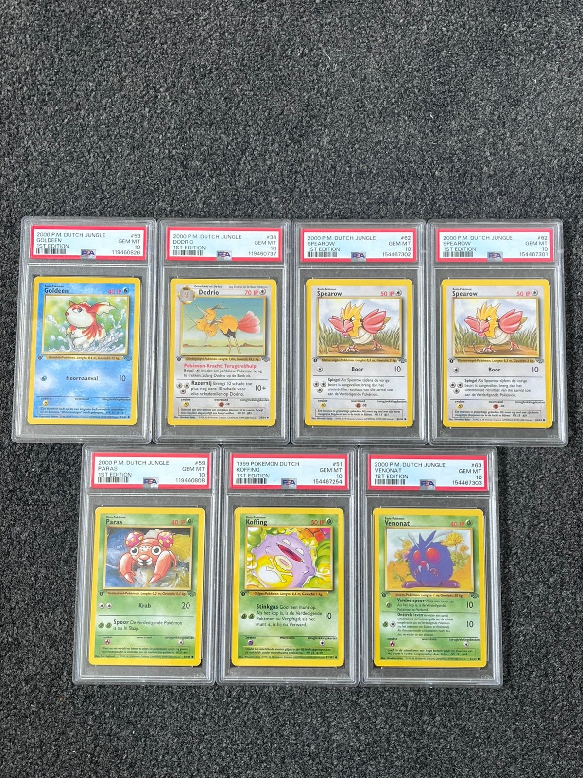 Pokémon 7x PSA 10 Dutch 1st Ed. Jungle/Base set kaarten, Ophalen of Verzenden, Nieuw, Meerdere kaarten, Foil