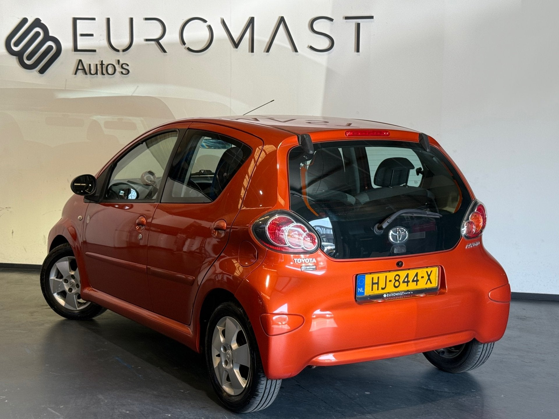 Toyota Aygo 1.0 VVT-i Comfort Orange Airco 5d Elektrische Ra, Voorwielaandrijving, Euro 5, Stof, Gebruikt
