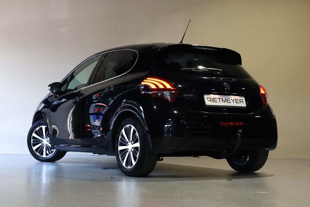 Peugeot 208 1.2 PureTech Allure |Camera |Carplay |Cruise, Auto's, Peugeot, Stof, 1199 cc, Met garantie (alle), 82 pk