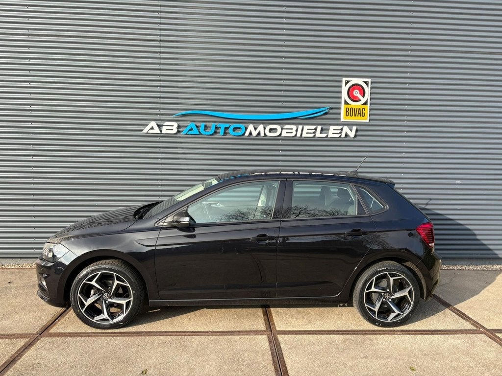 Volkswagen Polo 1.0 TSI Comfortline NAVI/ PARKEER SENSOR, Auto's, Volkswagen, Voorwielaandrijving, Gebruikt, 95 pk, Met garantie (alle)