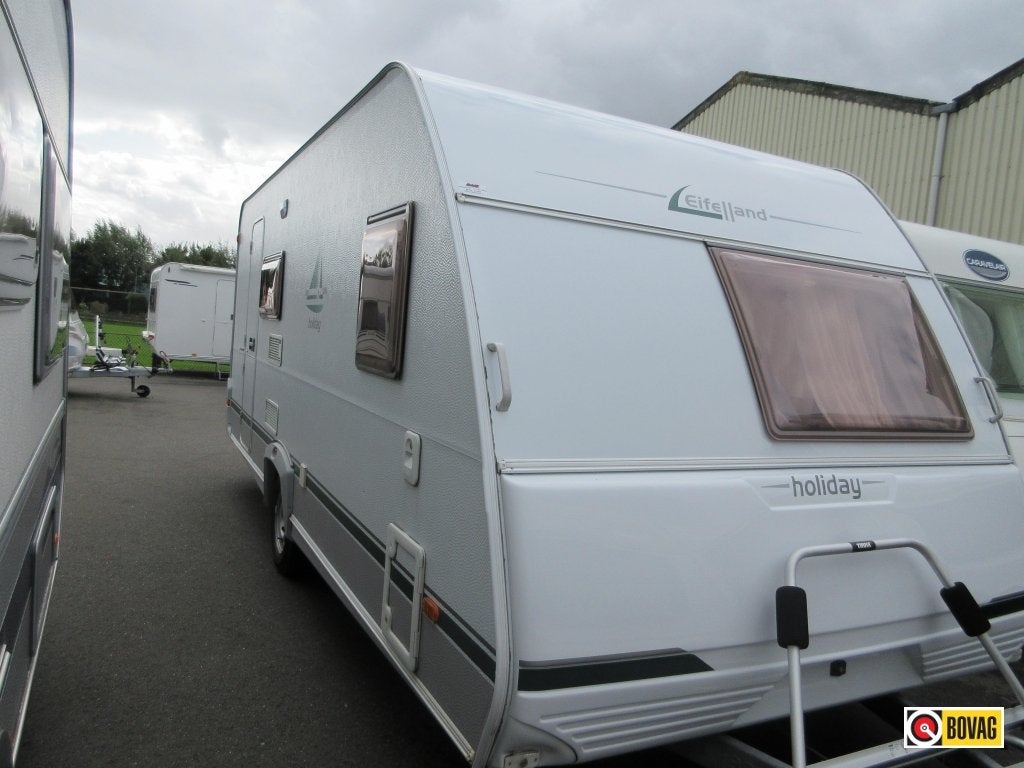 Eifelland Holiday 520 TKM 3 delig stapelbed, Caravans en Kamperen, Treinzit, Fietsenrek, Eifelland, 5 tot 6 meter