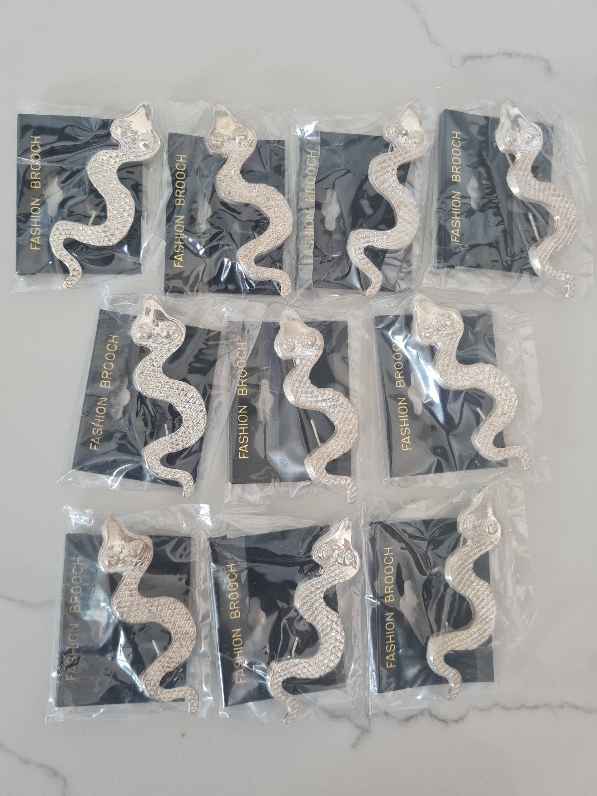 10x Zilverkleurige Metalen Slang Broches - 7cm, Sieraden, Tassen en Uiterlijk, Broches, Overige materialen, 4 tot 7 cm, Nieuw