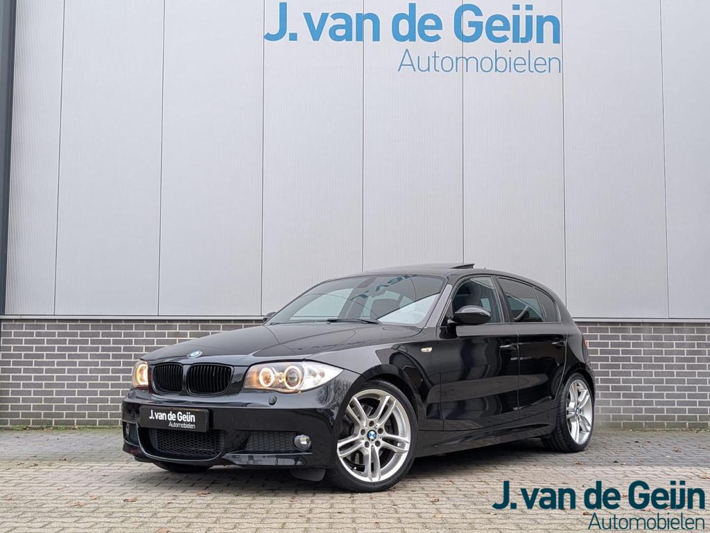 BMW 1-serie 130i High Executive | M-pakket | Schuifdak | Xen, Achterwielaandrijving, Gebruikt, Leder en Stof, Handgeschakeld