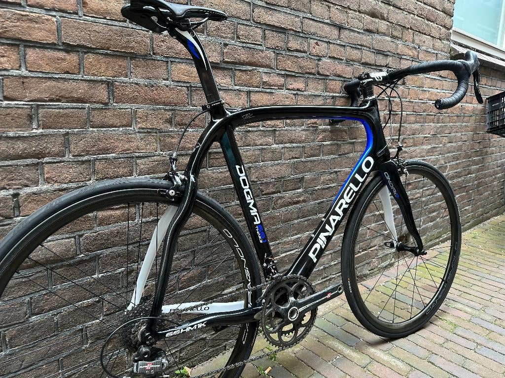 Pinarello Dogma 65.1 Think 2 Campagnolo Super Record, 28 inch, Carbon, Heren, Hinthamerstraat
