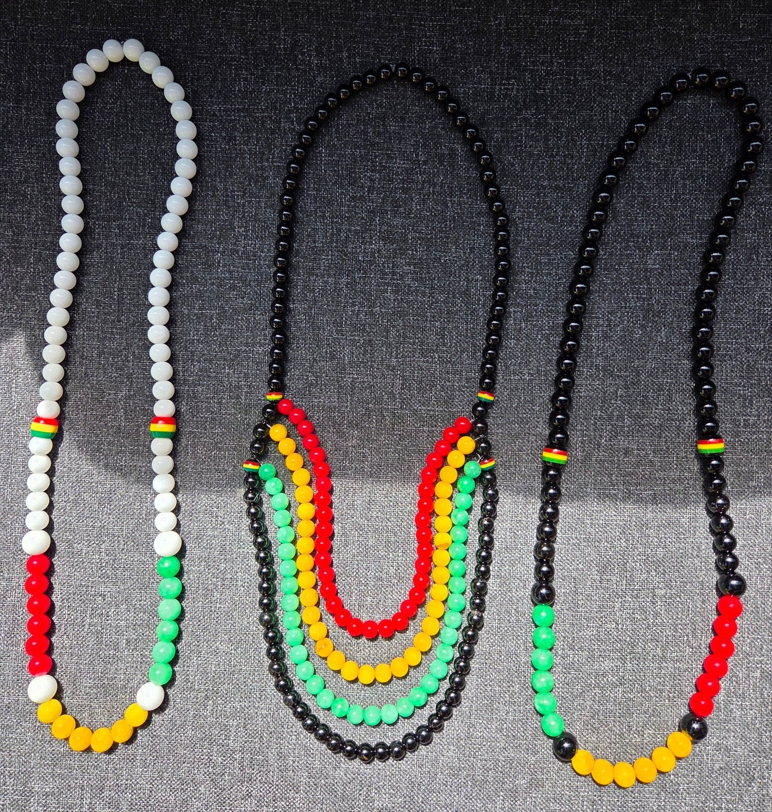 rasta armbanden kettingen reggae, Ophalen of Verzenden, Nieuw, Overige kleuren, Overige materialen