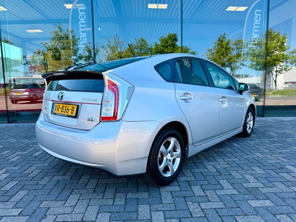 Toyota Prius 1.8 Hybrid 136pk automaat Dynamic Business deal, Auto's, Toyota, Euro 5, Gebruikt, Zwart, 4 cilinders