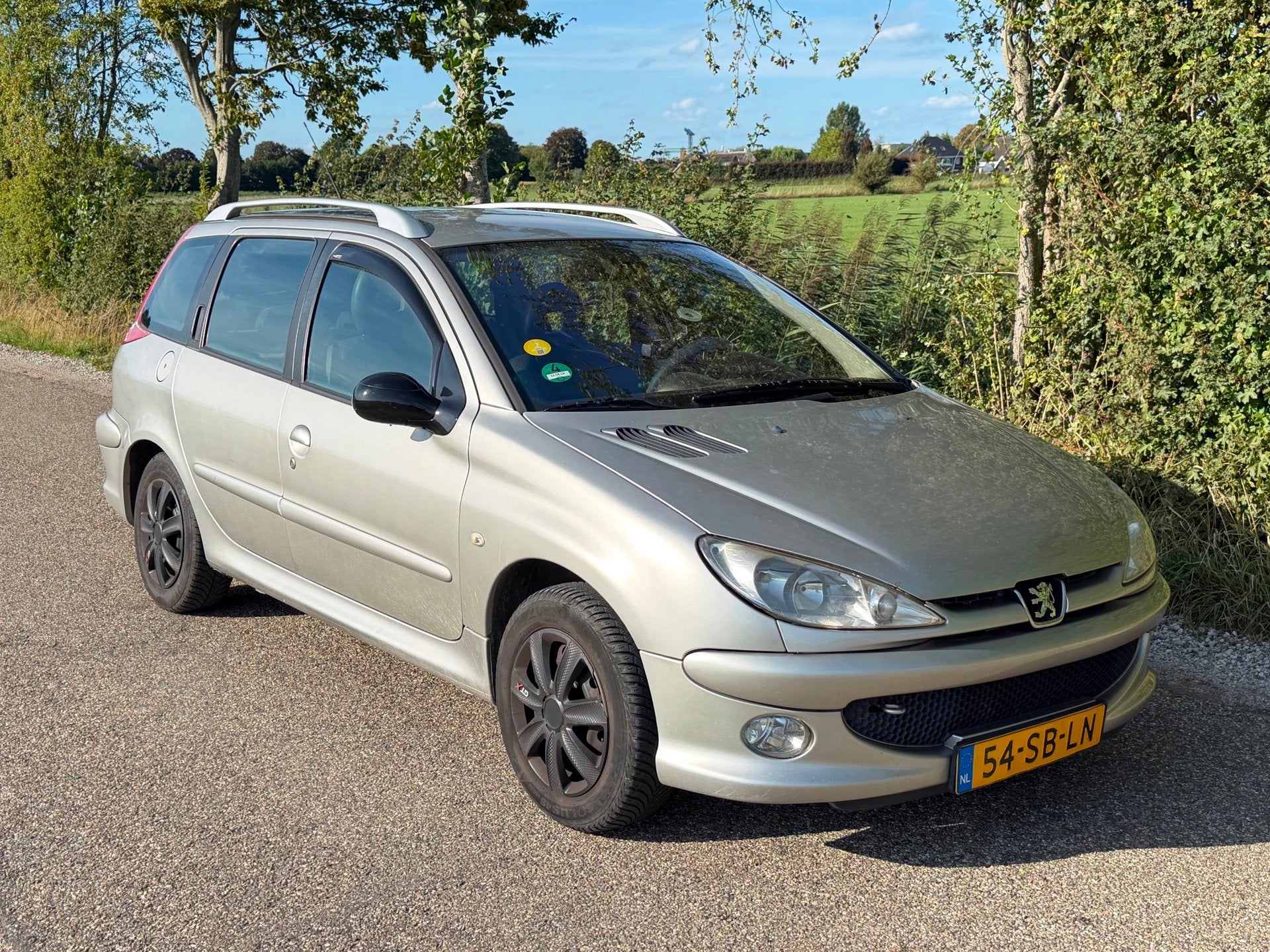 Peugeot 206 SW 1.6-16V Griffe APK 03-2027 NAP Leder NAP, Auto's, Peugeot, Voorwielaandrijving, 15 km/l, Gebruikt, Zwart