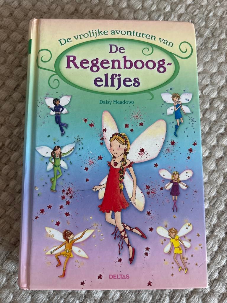 Daisy Meadows - De vrolijke avonturen van de regenboogelfjes, Boeken, Gelezen, Daisy Meadows, Fictie algemeen, Ophalen of Verzenden