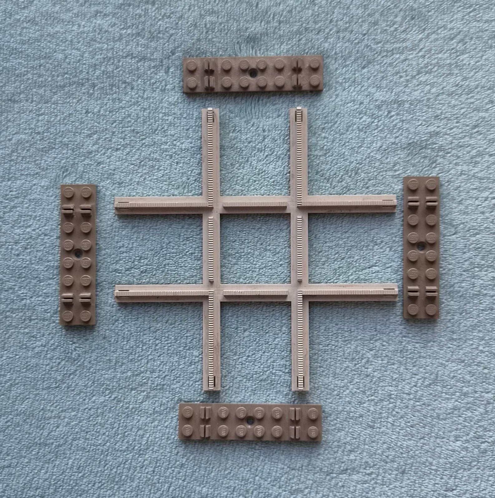 Lego trein 4,5 Volt grijze rails kruispunt met bielzen., Ophalen of Verzenden, Gebruikt, Losse stenen, Lego