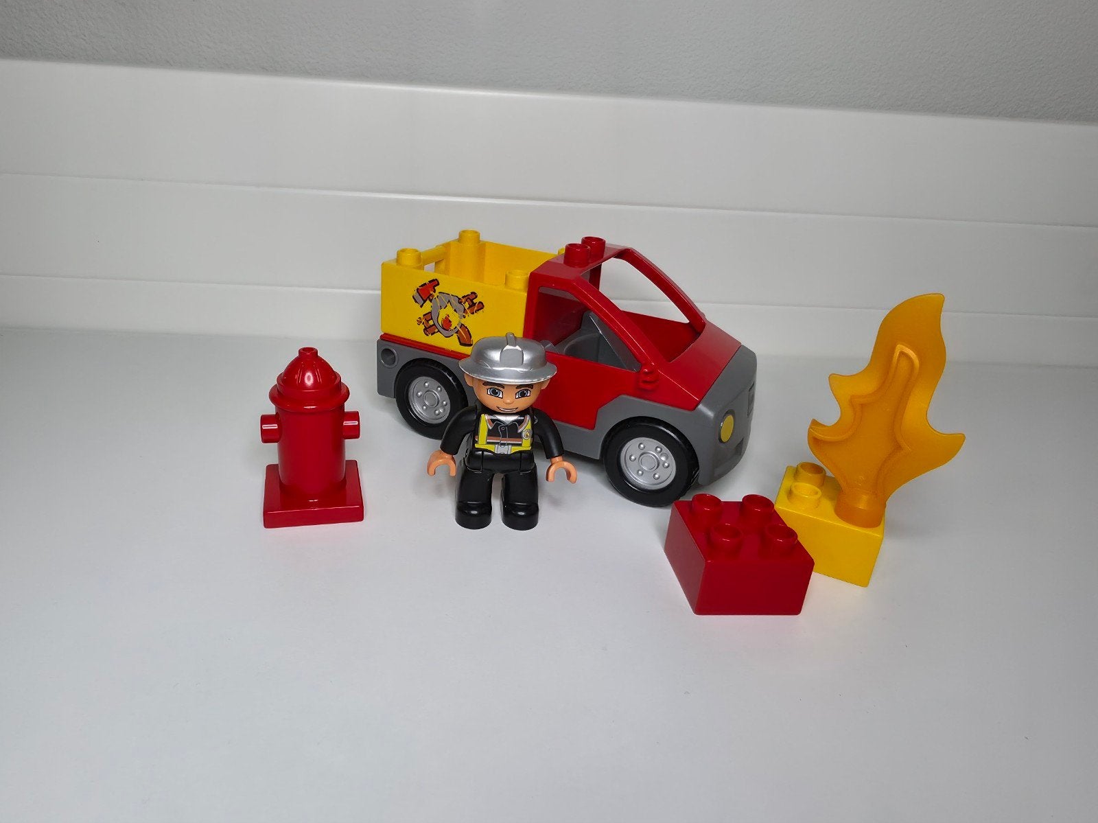 LEGO Duplo Brandweer auto met brandweerman en accessoires, Ophalen of Verzenden, Gebruikt, Duplo