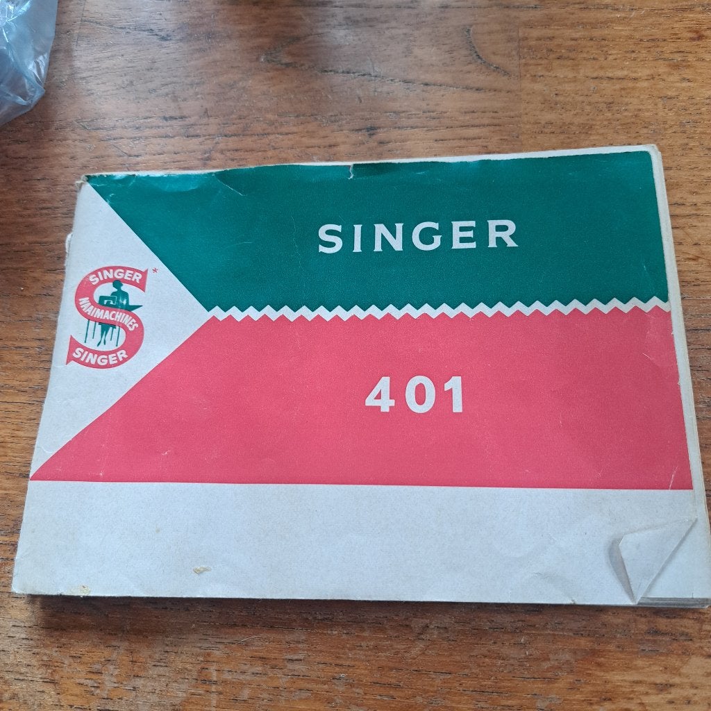 Gebruiksaanwijzing Singer 401 naaimachine, Ophalen
