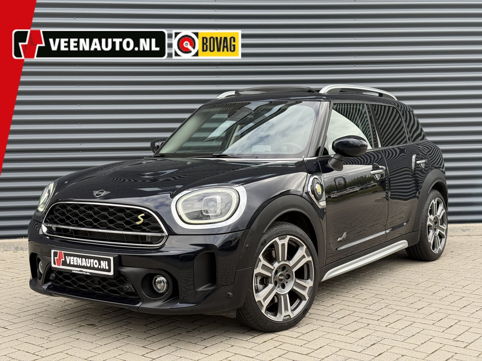 MINI Countryman 2.0 Cooper SE ALL4 Pano/H&K/Leder/Camera, Auto's, Automaat, Dealer onderhouden, Gebruikt, Zwart