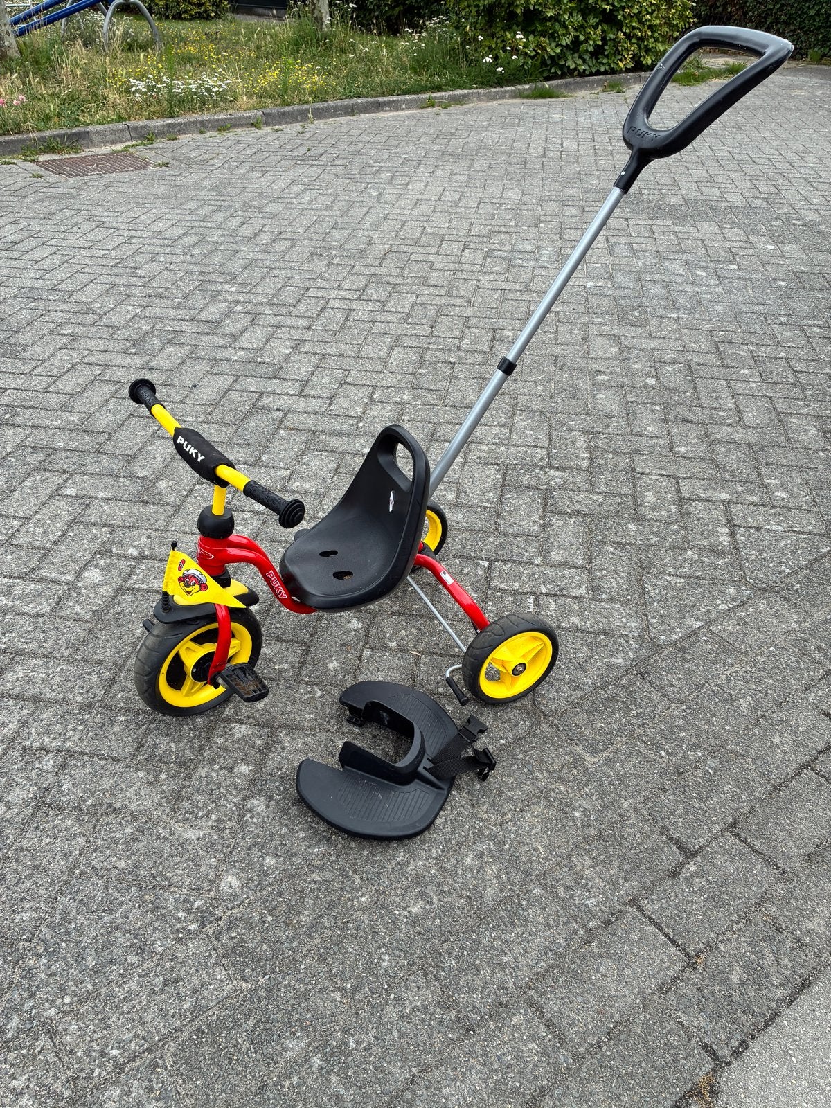 Puky driewieler met duwstang en voetensteun, Ophalen, Gebruikt, Trapvoertuig