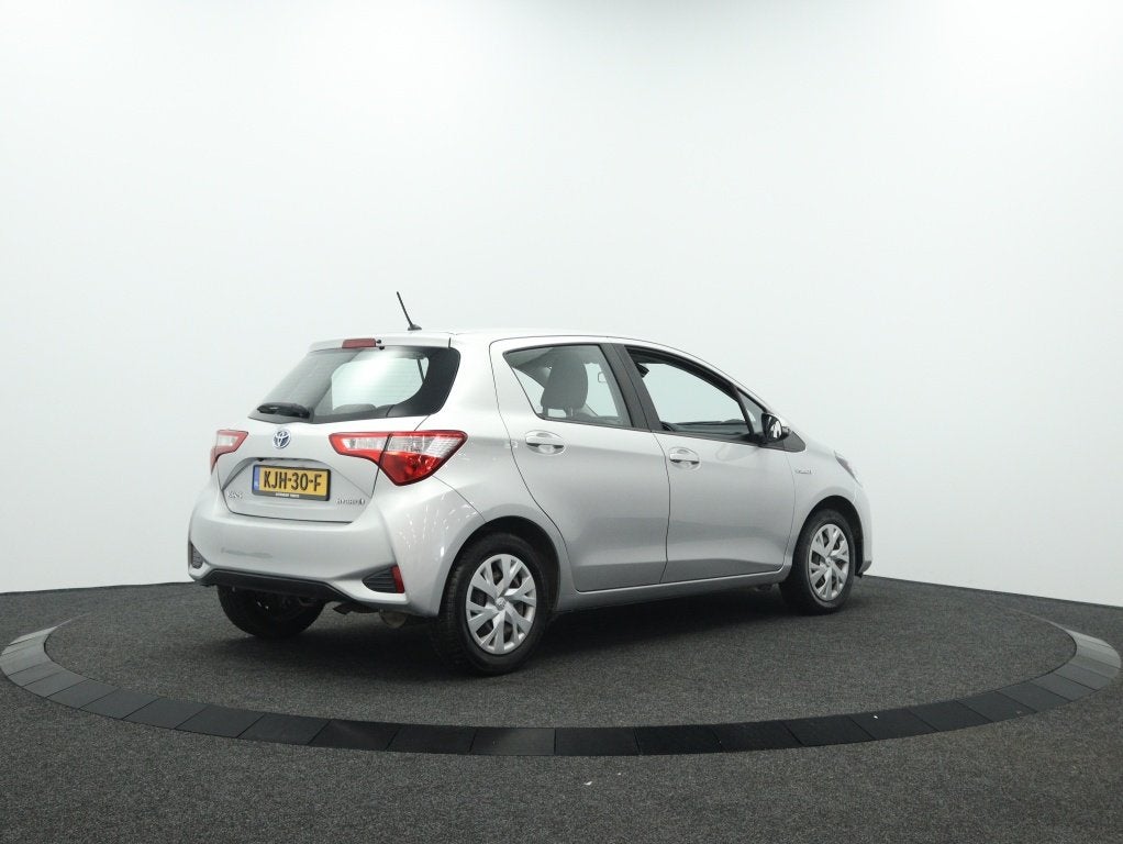 Toyota Yaris 1.5 Hybrid Active | Navigatie | Camera | Cruise, Auto's, Automaat, 12 maanden, Gebruikt, Euro 6