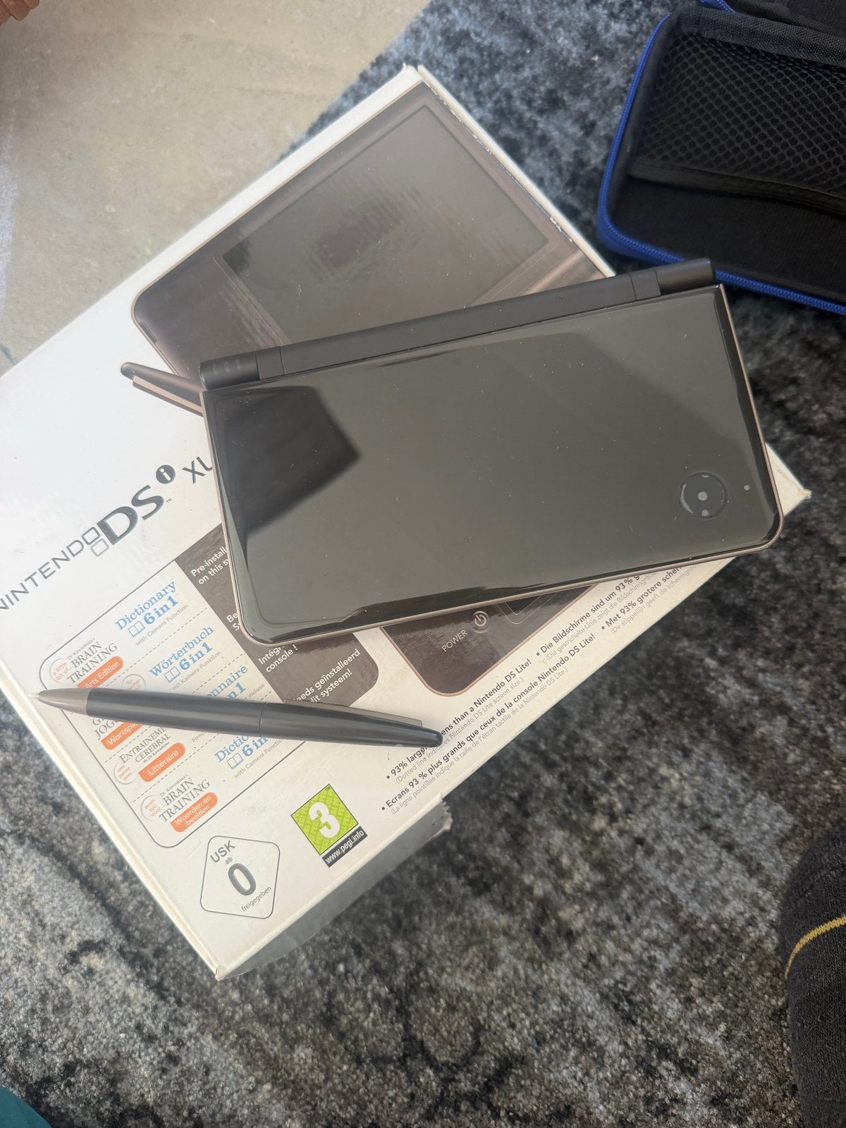 Nintendo DSi XL - Zwart met stylus en doos, Spelcomputers en Games, Spelcomputers | Nintendo DS, Ophalen of Verzenden, Gebruikt