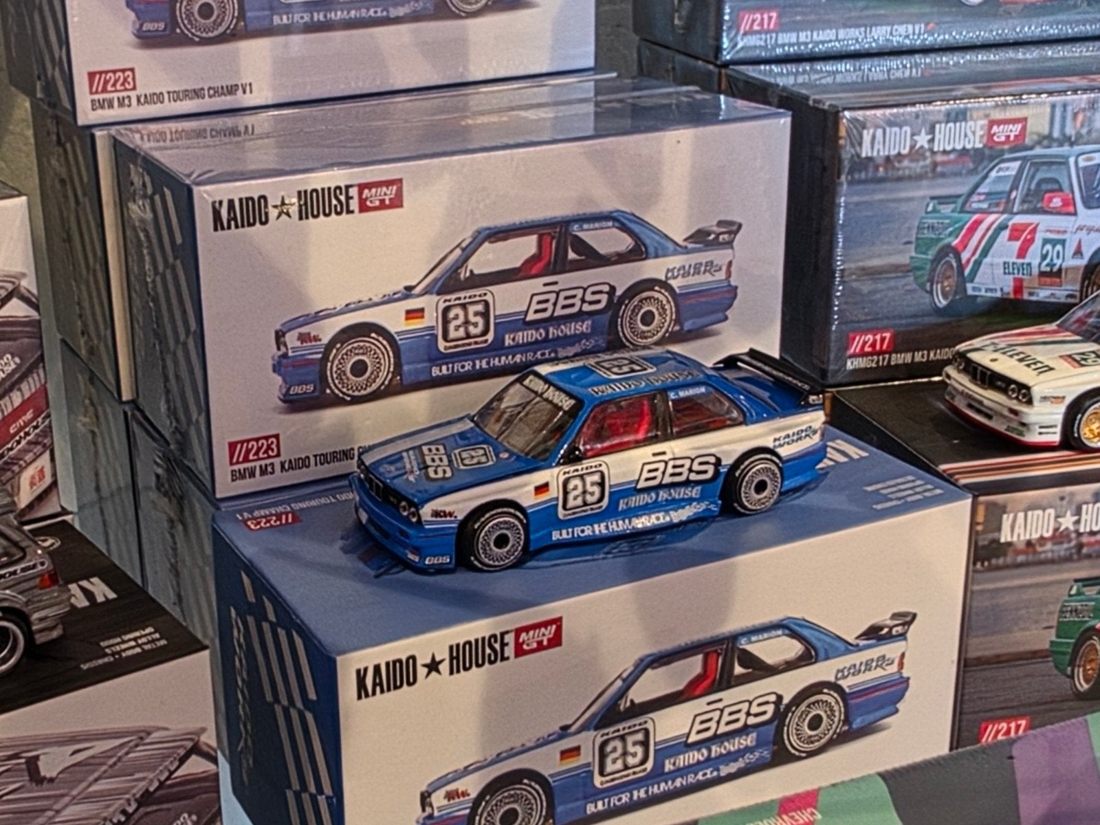BMW M3 (E30) Kaido Touring Champ V1 '89, Kaido house 1:64, Auto, Mini GT kaido House, Nieuw, Ophalen of Verzenden