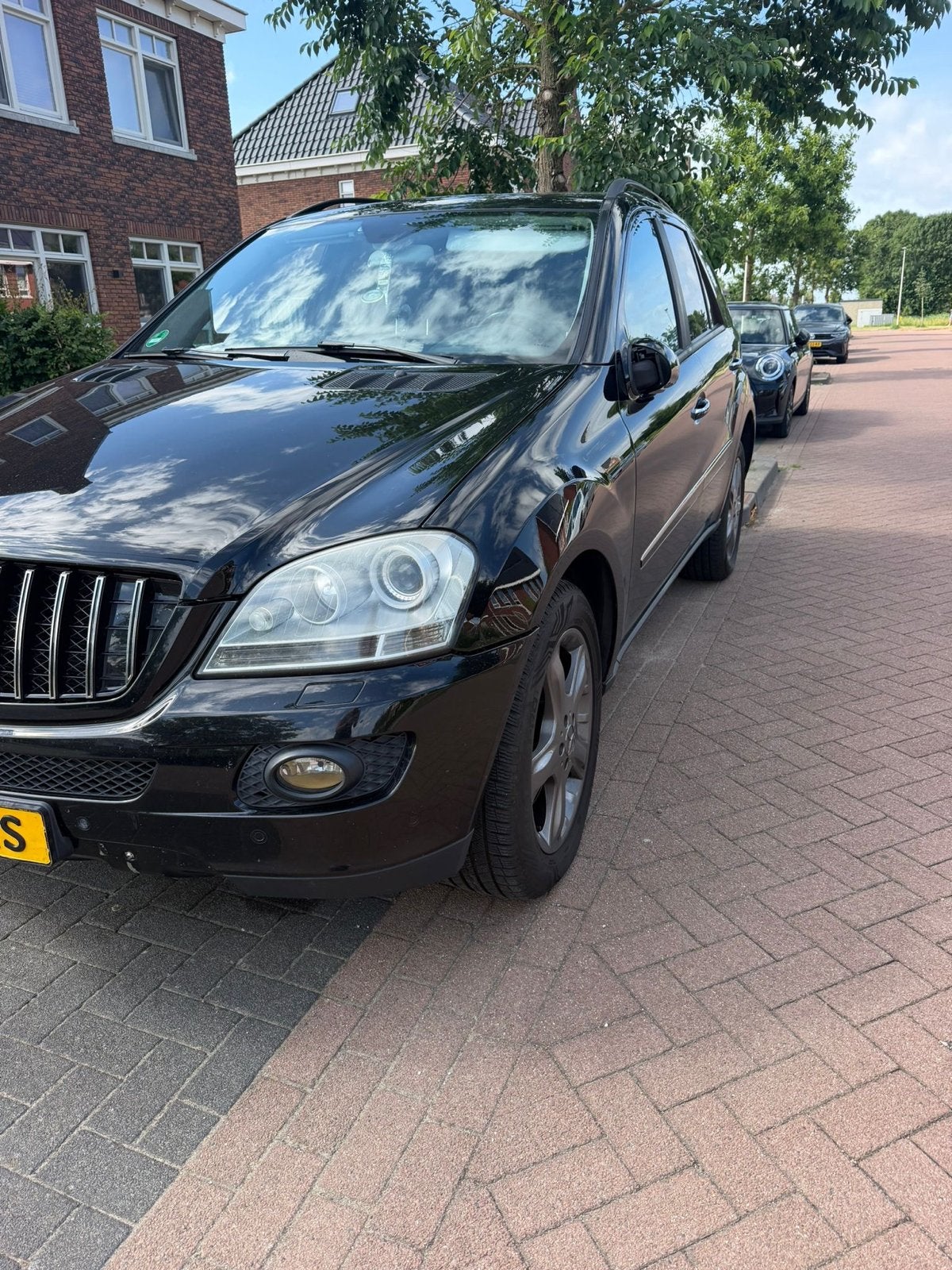 Mercedes-Benz M-Klasse 5.0 Ml500 4MATIC AUT 2006 Zwart, Auto's, Mercedes-Benz, Automaat, Leder en Stof, Vierwielaandrijving, Particulier