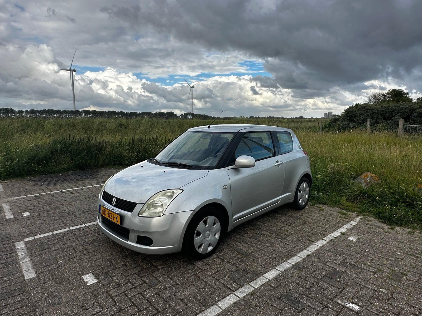 Suzuki Swift 1.3 3D 2007 Grijs, Stof, Swift, Handgeschakeld, 1000 kg