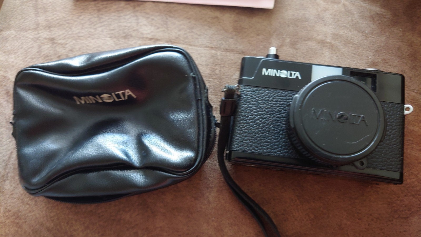 Minolta Hi-matic G2 analoge camera met opbergtas, Audio, Tv en Foto, Fotocamera's Analoog, Ophalen of Verzenden, Gebruikt, Compact