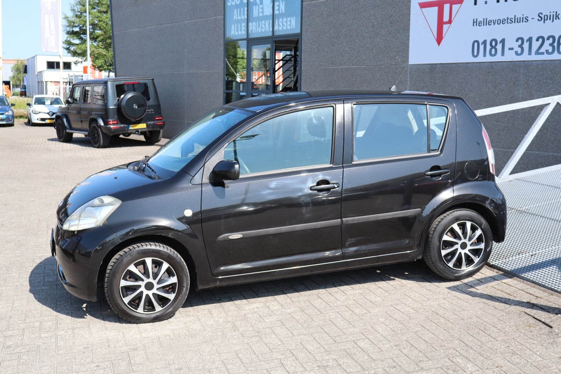 Daihatsu Sirion 2 1.0-12V Airco/Afneembare trekhaak/Radio/El, Voorwielaandrijving, Stof, Gebruikt, Zwart