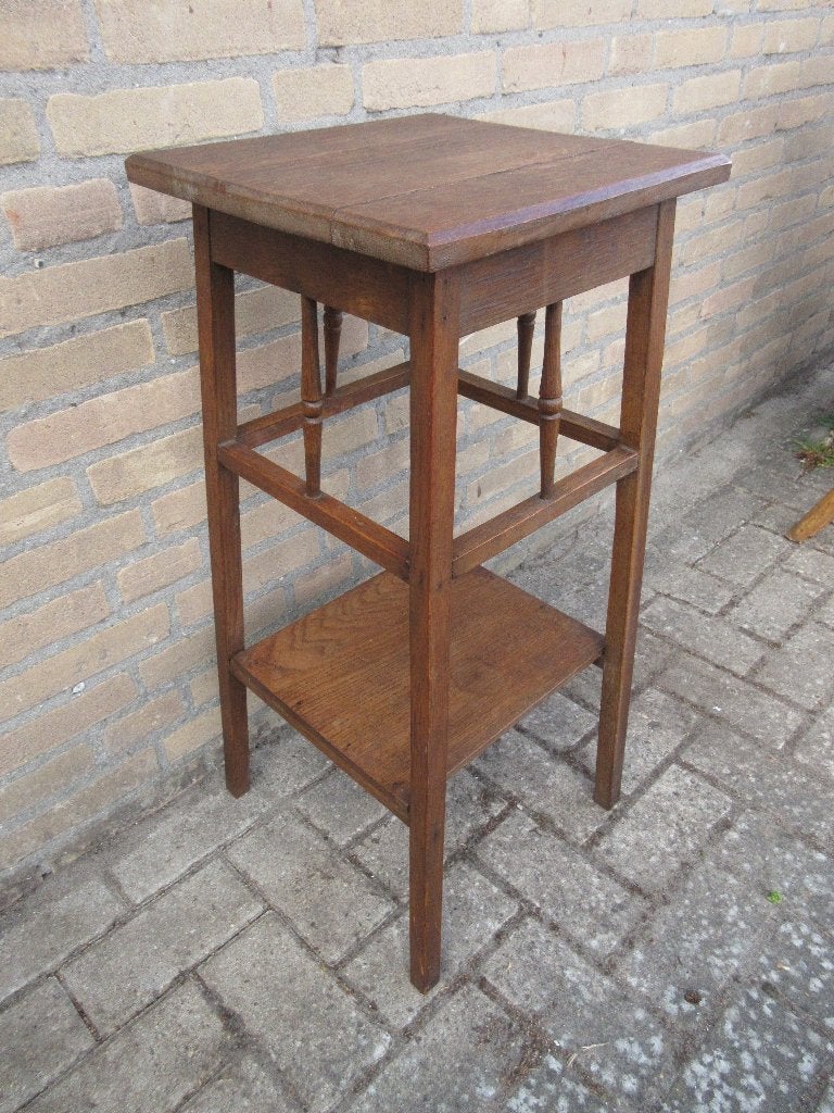 Antieke hoge houten plantentafel, Ophalen
