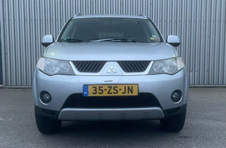 Mitsubishi Outlander 2.4 2008 - NWE APK - TECHNISCH GOED!!, Auto's, Voorwielaandrijving, Outlander, Zwart, 4 cilinders