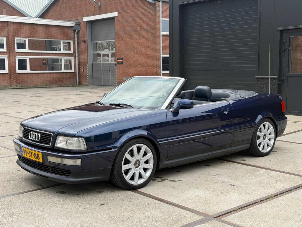 Audi Cabriolet 80 2.6 V6 AUT NL NAP NIEUWSTAAT, Gebruikt, Leder en Stof, 1000 kg, Blauw
