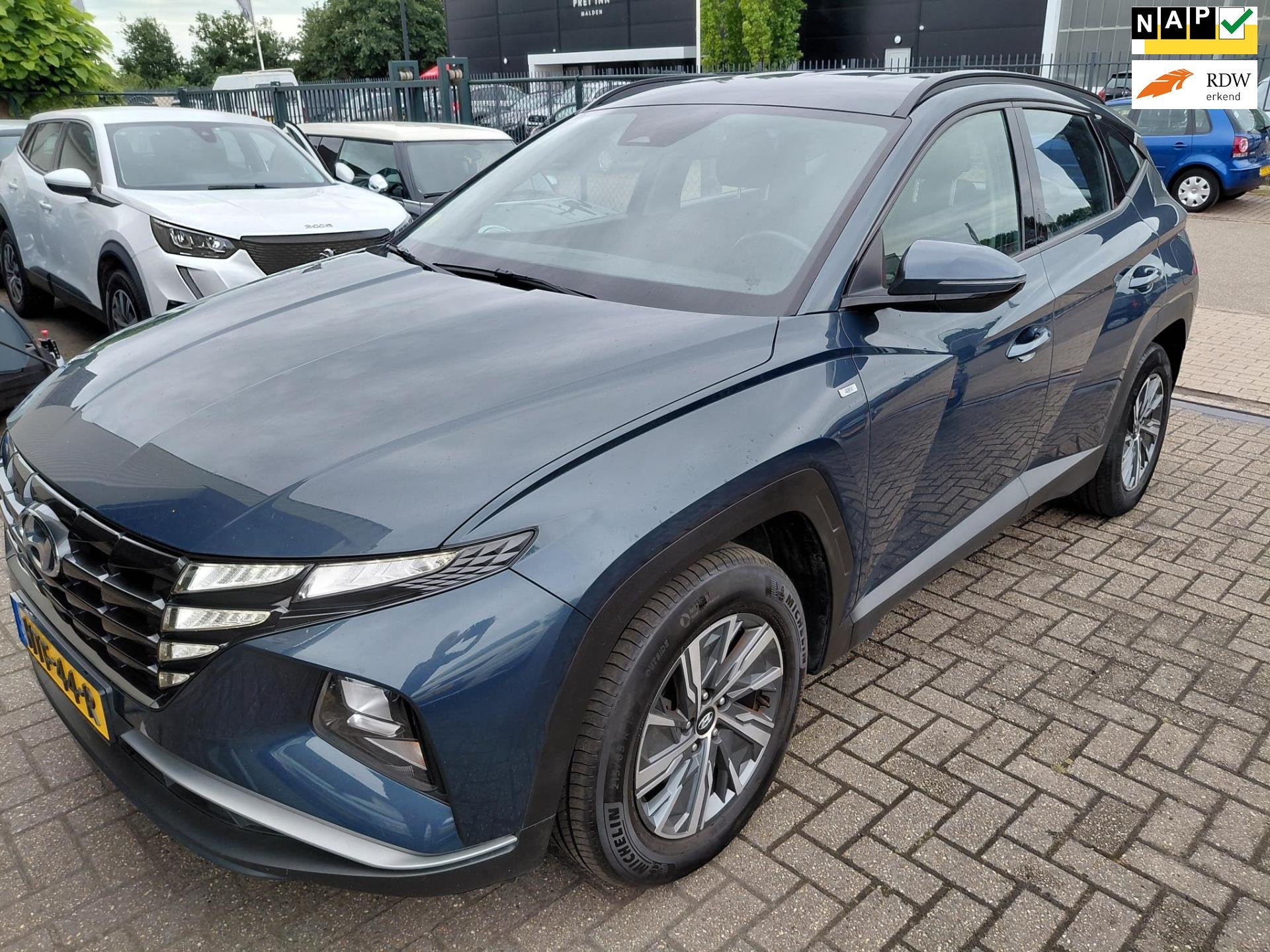 Hyundai Tucson Hybride Automaat, Auto's, 136 pk, Gebruikt, Blauw, 1650 kg