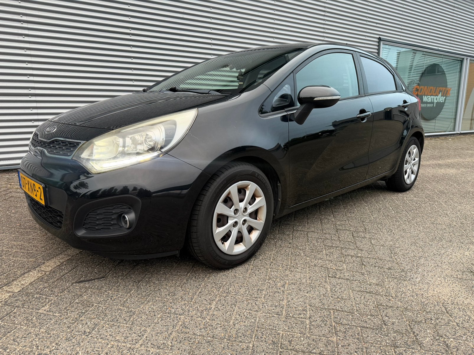 Kia Rio 1.2 I 5DRS 2012 Zwart super pack. Navigatie,airco.