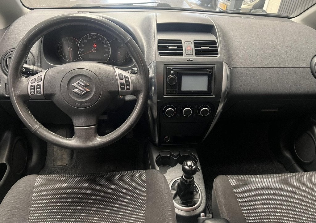 Suzuki SX4 1.6 Shogun - 2e eigenaar -NAP -NAV - Airco - Crui, Gebruikt, Zwart, 4 cilinders, 49 €/maand