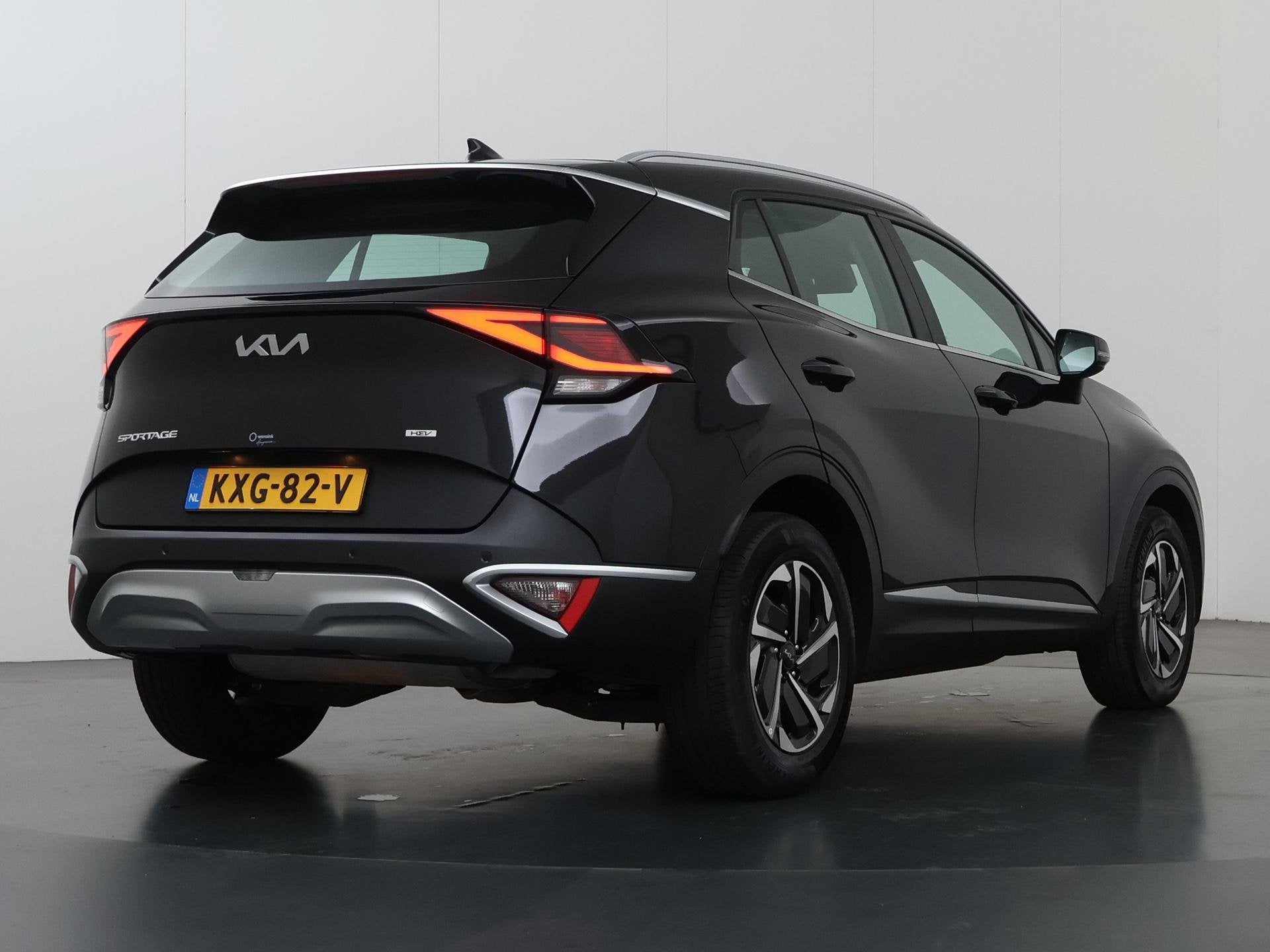 Kia Sportage 1.6 T-GDi Hybrid DynamicLine | Navigatie | Park, Auto's, Stof, Gebruikt, Euro 6, 4 cilinders