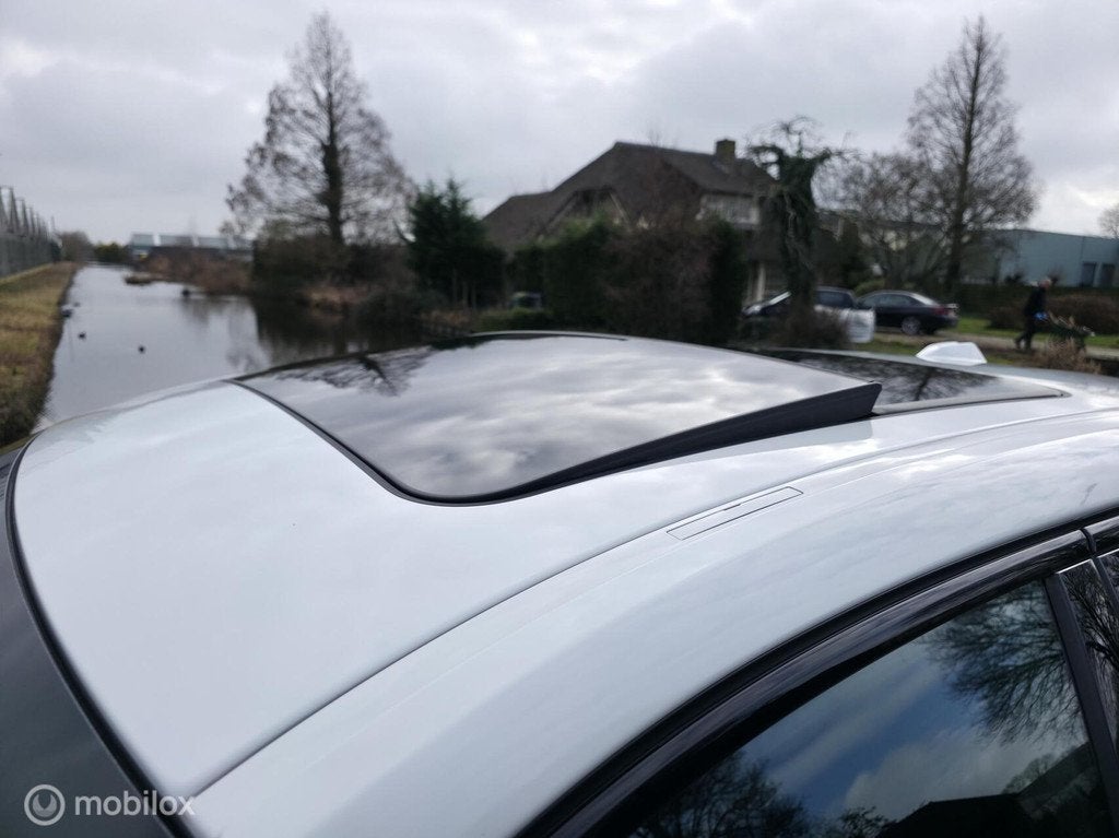 BMW 1-serie 123 xDrive / Pano / 360' camera / Navi, 1998 cc, Gebruikt, Zwart, 4 cilinders