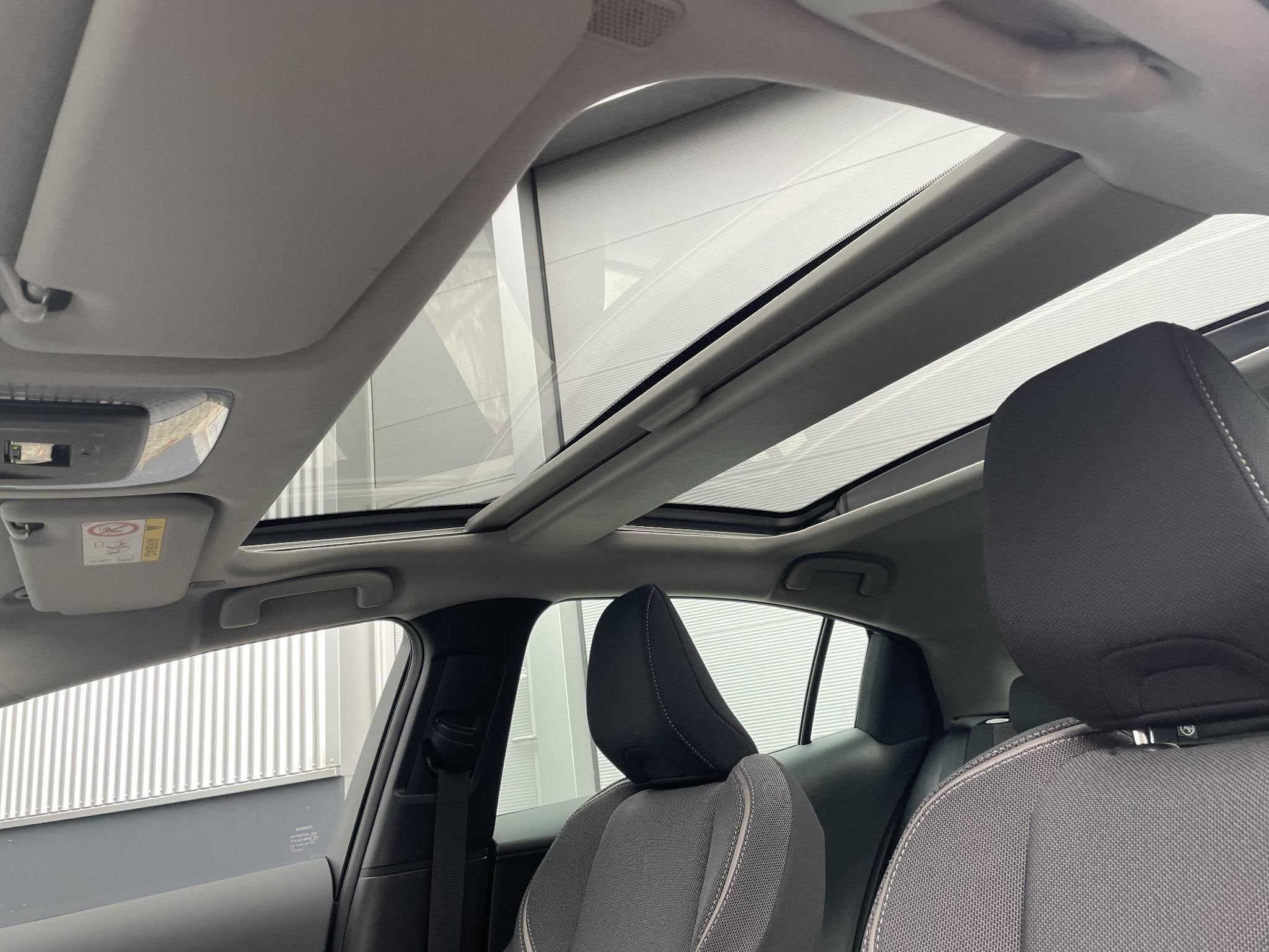 Toyota Prius 2.0 Plug-in Executive , Panoramadak, 12.000 Km, Auto's, Dealer onderhouden, Gebruikt, 4 cilinders, Plug-in hybride