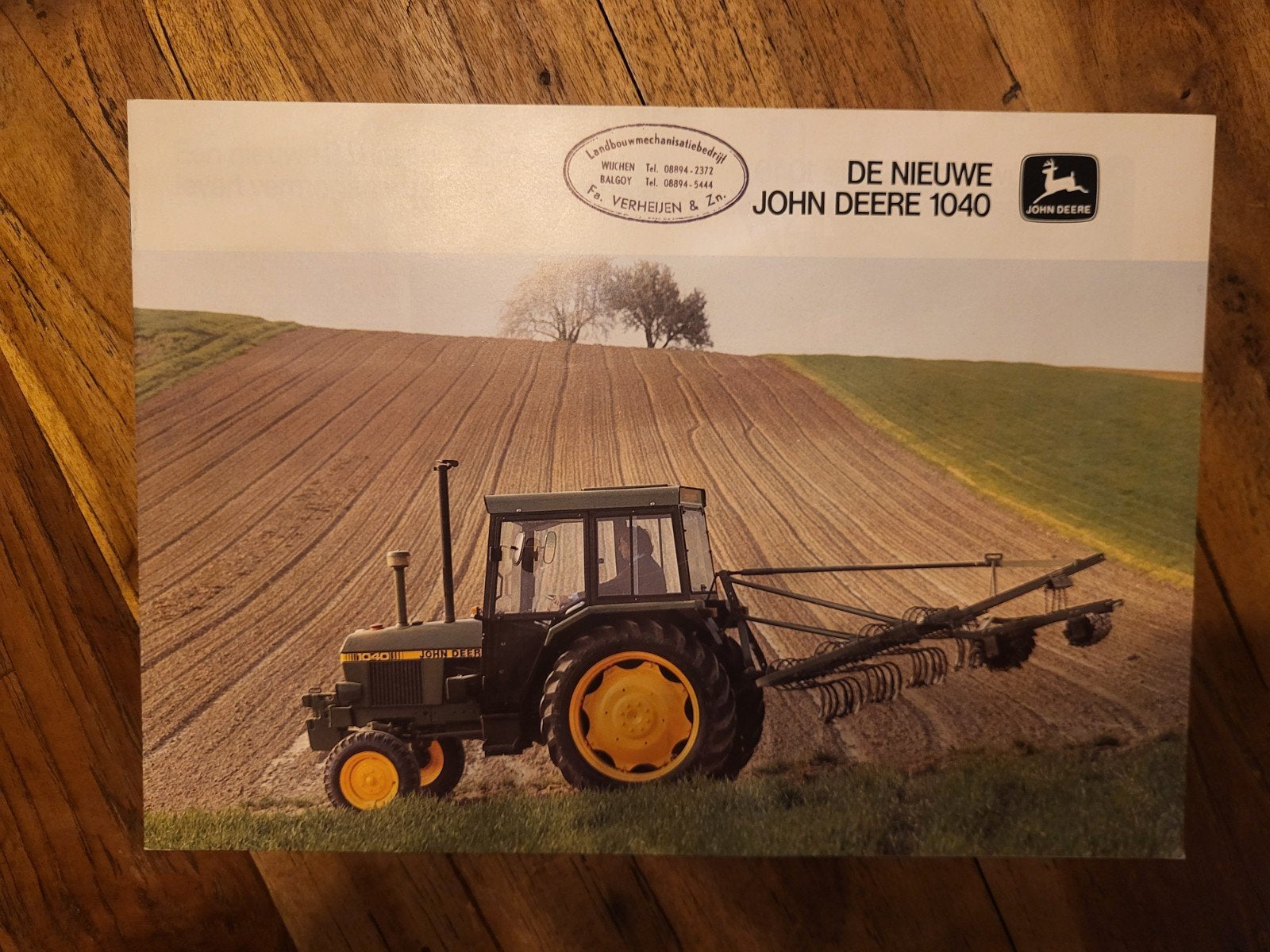 tractor folder John Deere 1040, Ophalen of Verzenden, Zo goed als nieuw