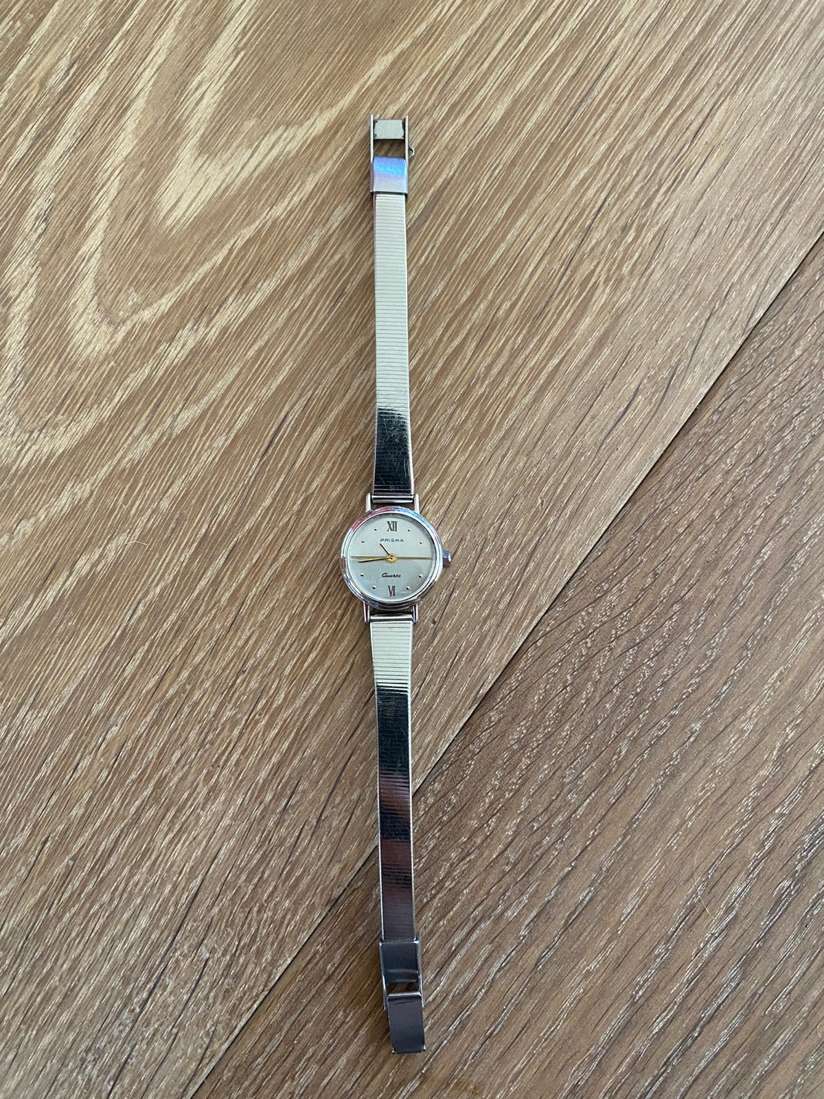 Elegant Prisma Quartz dameshorloge zilverkleurig, Sieraden, Tassen en Uiterlijk, Horloges | Dames, Overige merken, Staal, Gebruikt