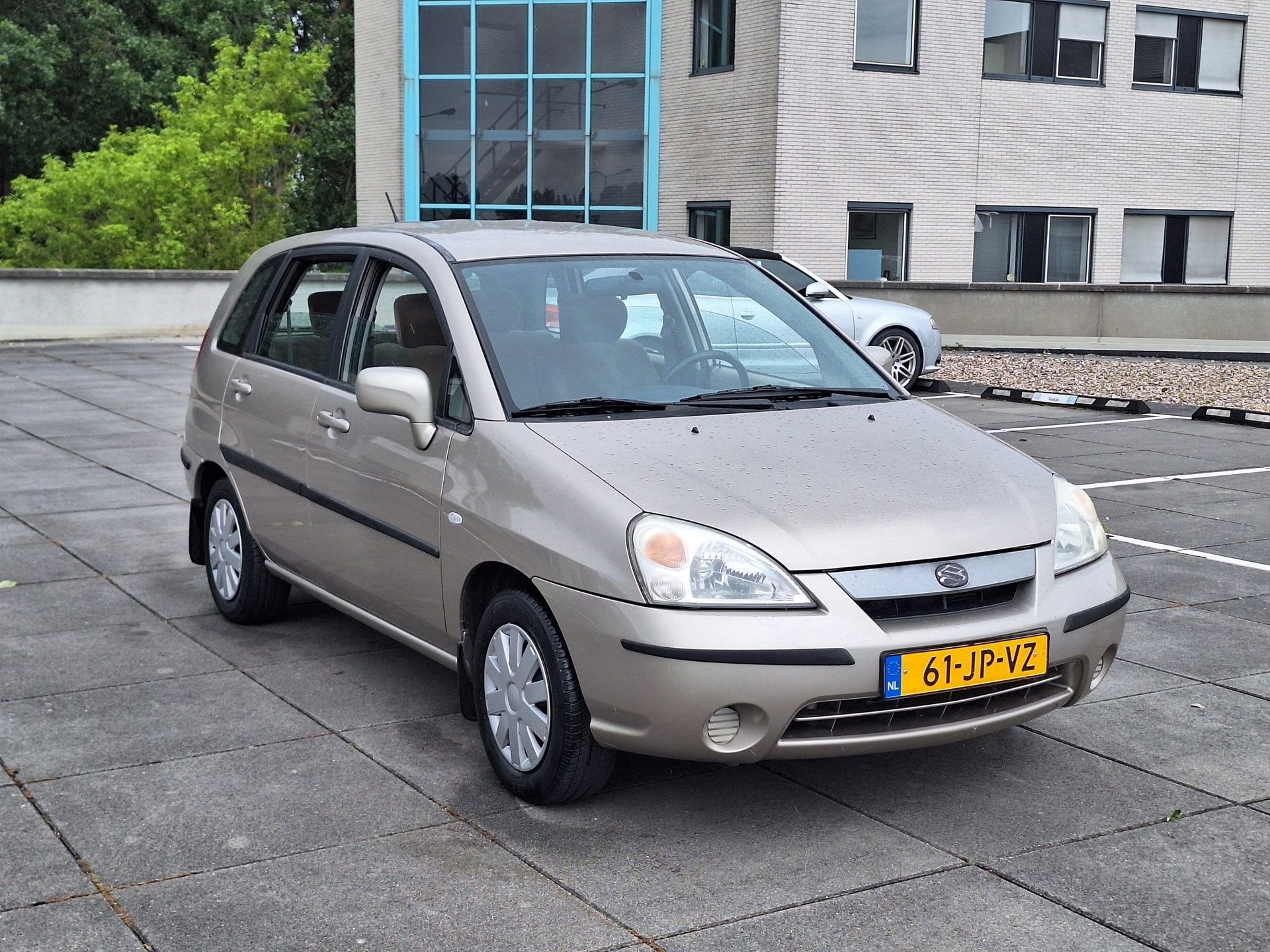 Suzuki Liana €2249,-1.6 GLX Apk 07/2027 Airco + Trekhaak, Voorwielaandrijving, Stof, Gebruikt, Beige