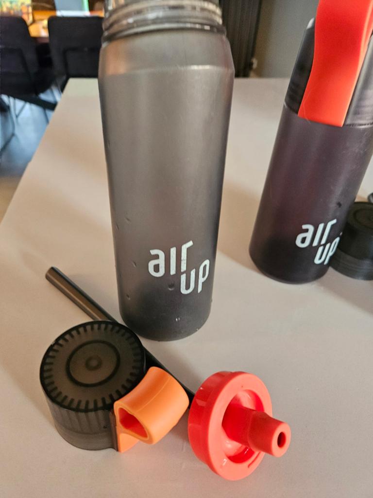 Air Up drinkfles met oranje dop en rietje, Sport en Fitness, Bidons, Ophalen of Verzenden, Gebruikt