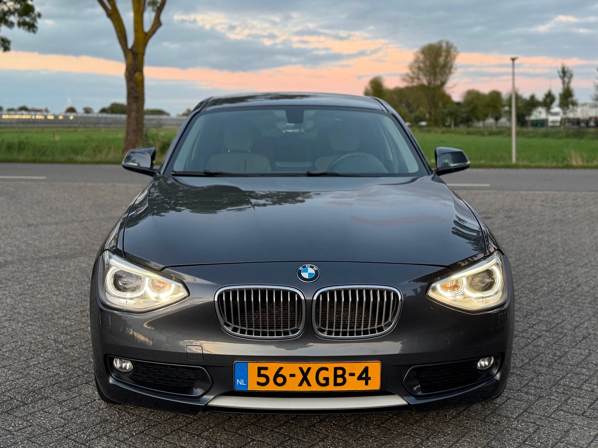 BMW 1-serie 116i Urban-Line 5D (bj 2012) NAVI|BI-XENON|LMV|A, Auto's, 1-Serie, Euro 5, Gebruikt, Zwart
