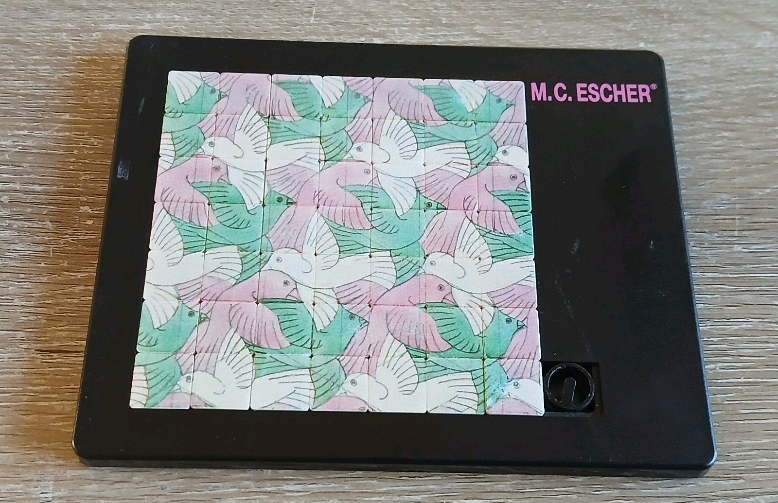 M.C. Escher schuifpuzzel vliegende vogels puzzel, Ophalen of Verzenden, Minder dan 500 stukjes, Zo goed als nieuw, Overige typen