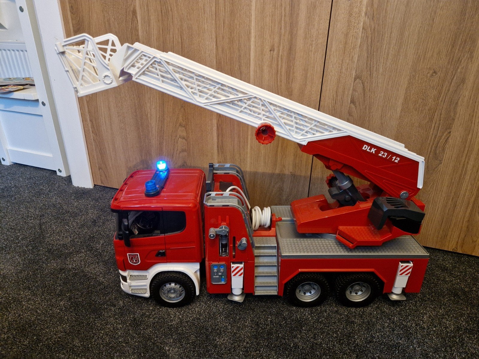 Bruder ladderwagen, Ophalen