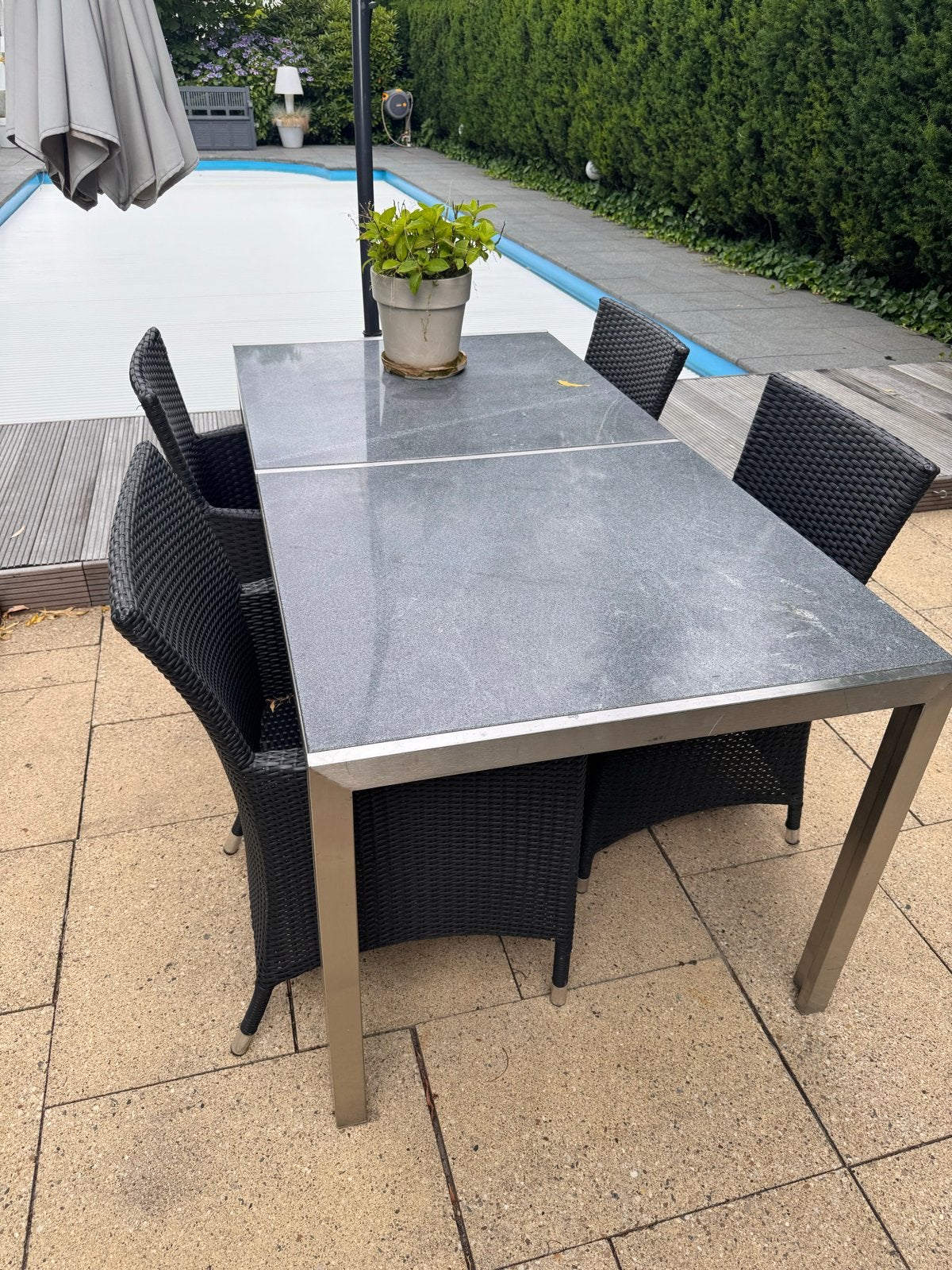 Tuinset met natuurstenen blad en 4 wicker stoelen, Ophalen, Gebruikt, Eettafel, Tuinset