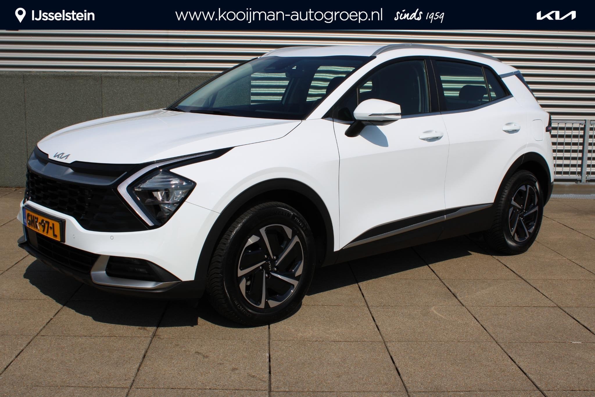 Kia Sportage 1.6 T-GDi Hybrid DynamicLine NAVIGATIE, ACHTERU