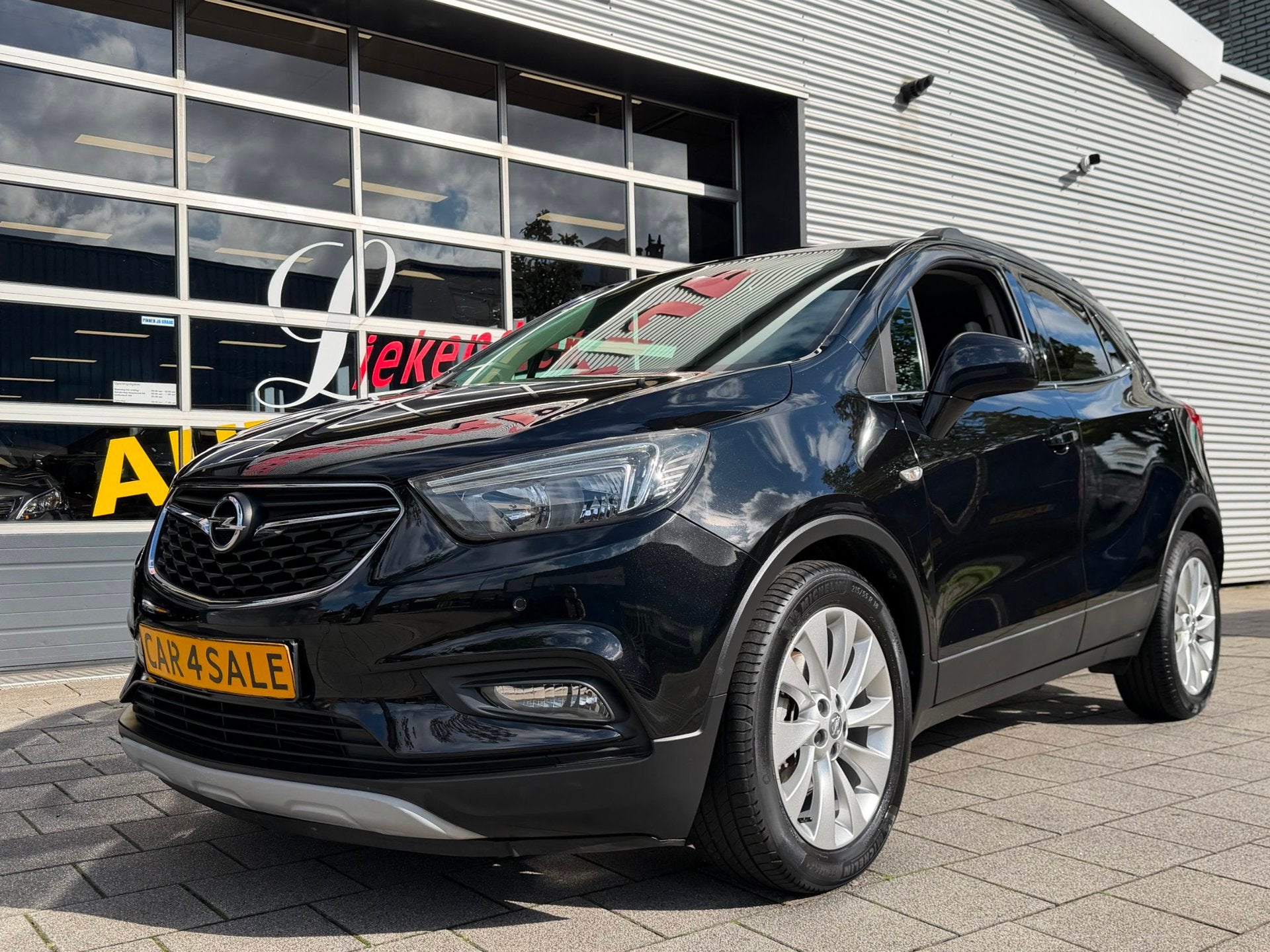 Opel Mokka X 1.4 Turbo Elite Edition - Navigatie I Leer I Ai, Auto's, Opel, Voorwielaandrijving, Gebruikt, Zwart, Zwart