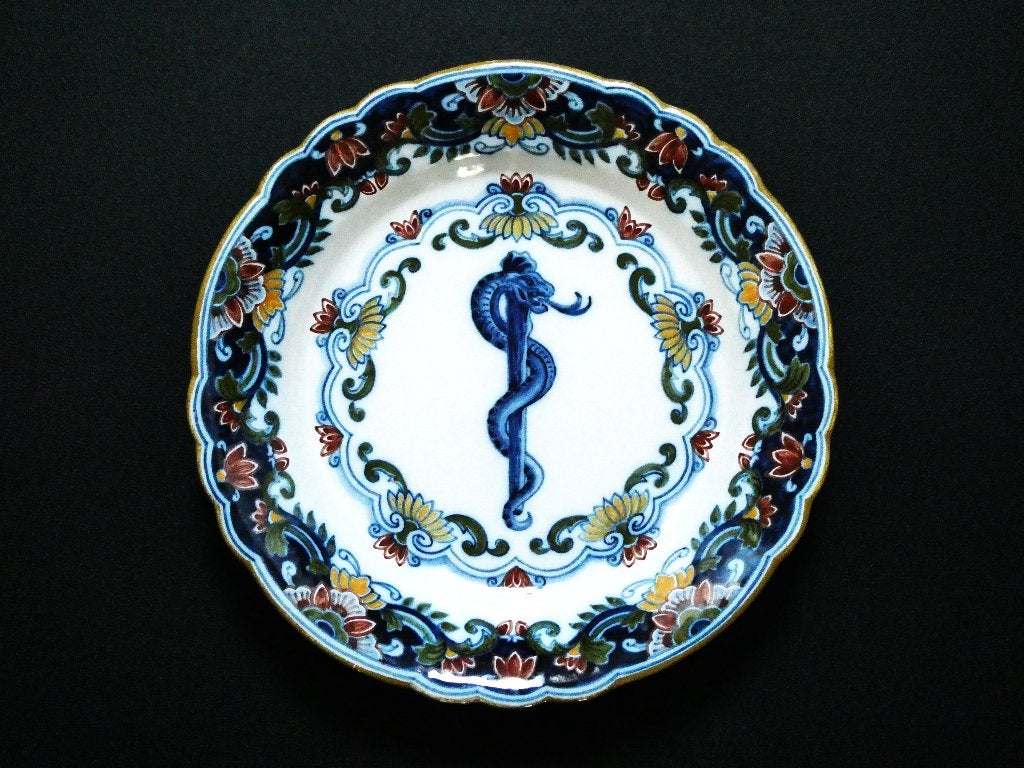 Koninklijke Tichelaar Makkum wandbord met esculaap / slang, Antiek en Kunst, Antiek | Keramiek en Aardewerk, Ophalen of Verzenden