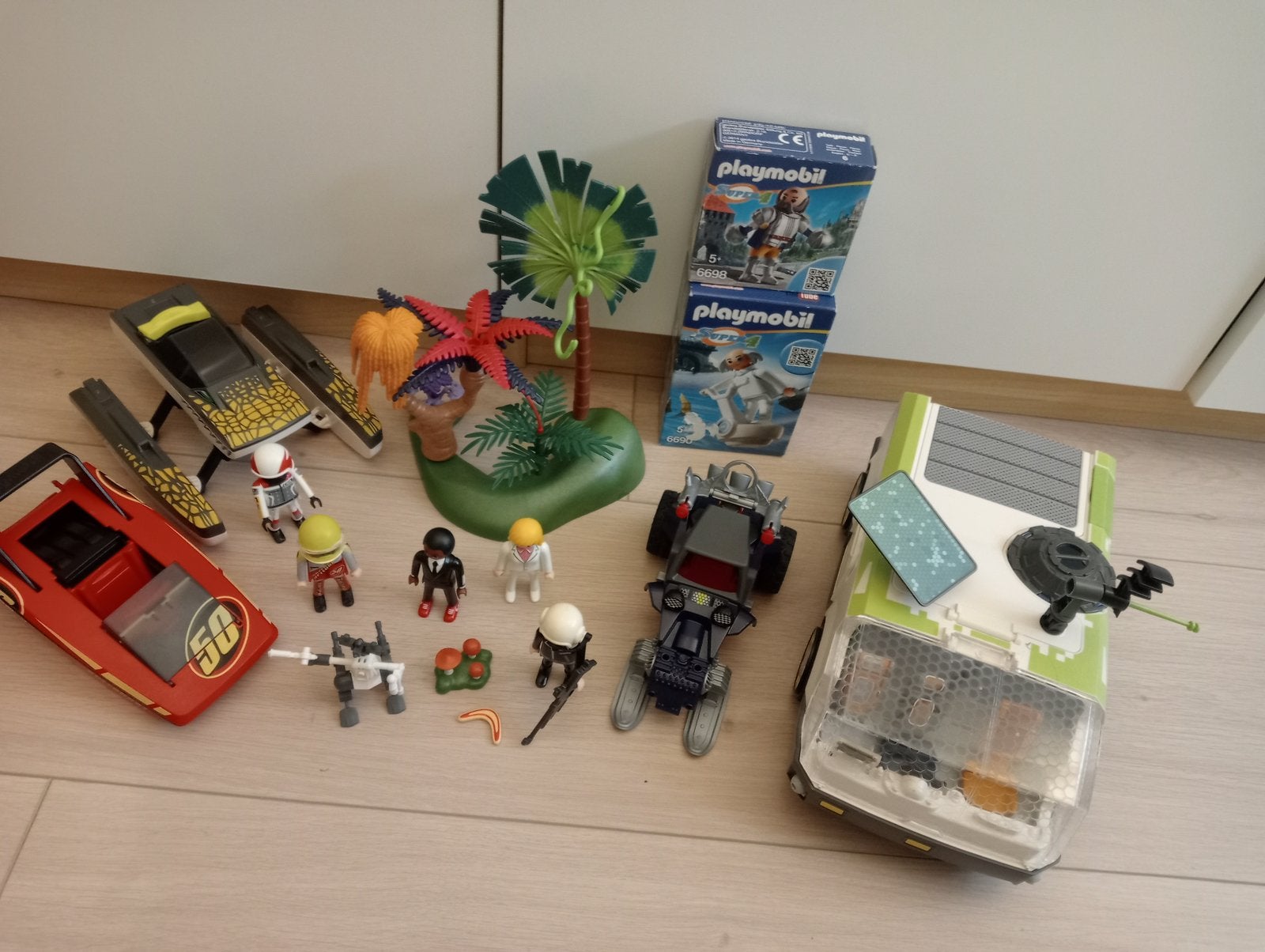 Playmobil set auto's en super 4 boot sneeuwscooter, Ophalen of Verzenden, Zo goed als nieuw, Complete set, Voertuig